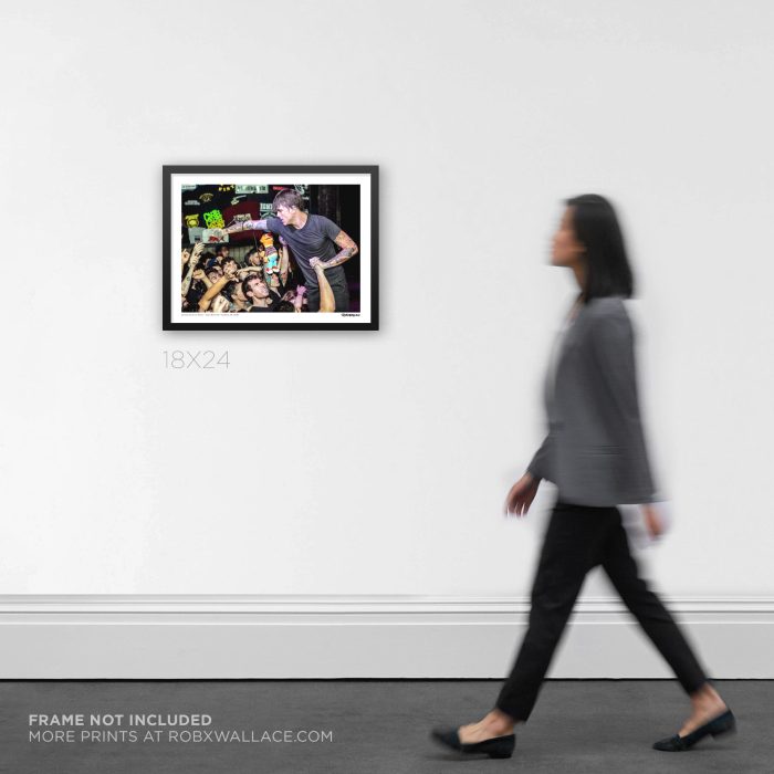 18x24 framed concert Graphic Design print of vocalist Anthony Green performing a high-intensity set with Saosin, mounted on an interior room wall to show scale.