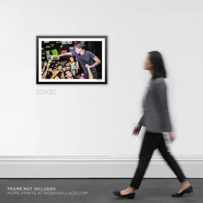 20x30 framed post-hardcore concert poster print of Anthony Green performing the song Voices live with Saosin, hanging on an interior room wall for scale.
