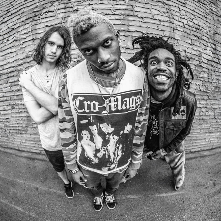 Full bleed black and white digital portrait Graphic Design asset featuring Yeti Bones, theOGM, and Brandon Pertzborn of Ho99o9 outside Club Dada in Dallas, TX.
