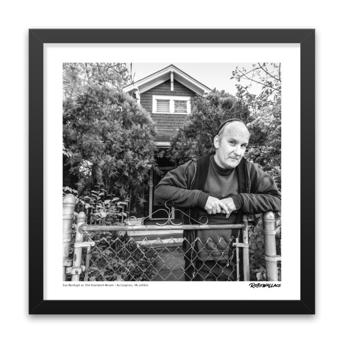 Close up of an 18X18 square framed punk rock documentary photo print of Ian MacKaye by Rob Wallace for music room decor.