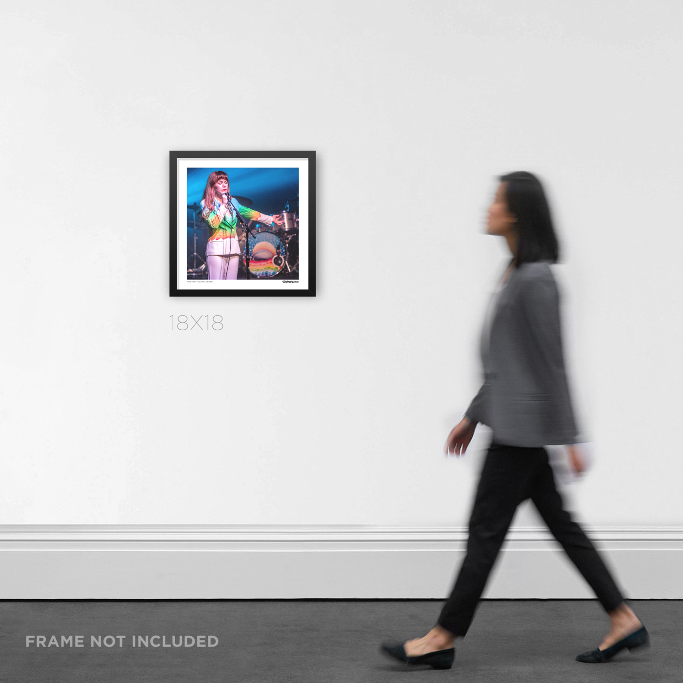 18x18 square framed live performance music print of indie icon Jenny Lewis the Santa Ana stage, displayed as modern living room wall decor for scale.