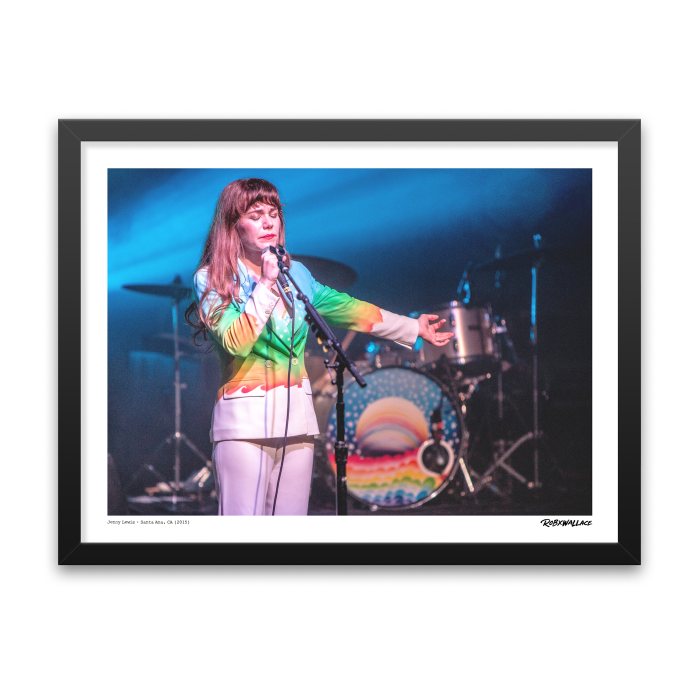 Detailed close up look at an 18x24 framed indie rock wall art print tracking Jenny Lewis singing in her custom rainbow suit at a sold-out Observatory show.