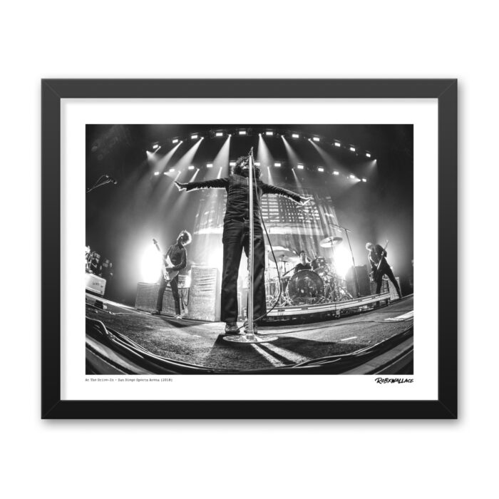 Detailed close up look at a 16x20 wide framed fine art music print the live presence and unpredictable movement of At The Drive-In.