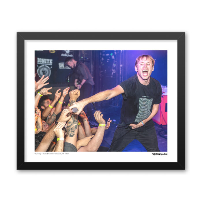 Detailed close up look at a 16x20 wide framed fine art music print the floor energy and vibrating walls during a classic 2018 album showcase.