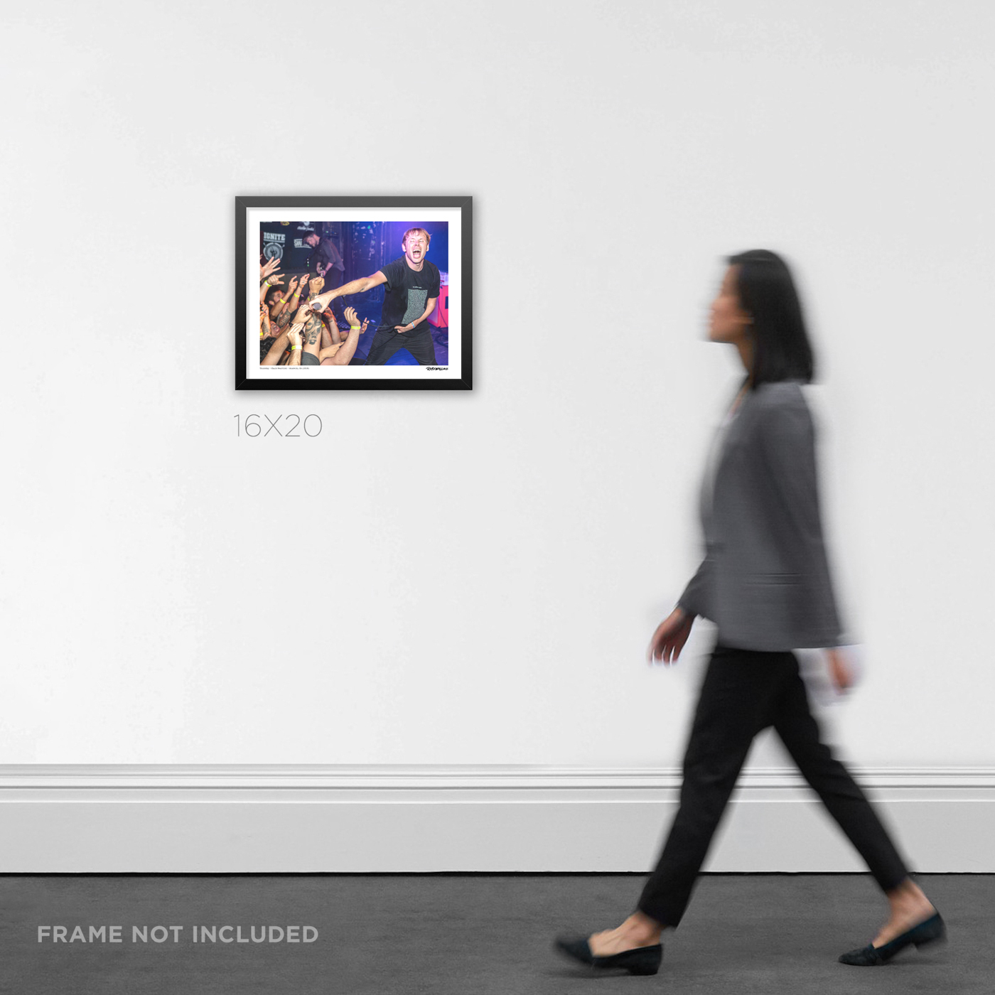 16x20 wide aspect framed emo concert Graphic Design print featuring the band Thursday live in Santa Ana, styled in a modern home office setting for scale.