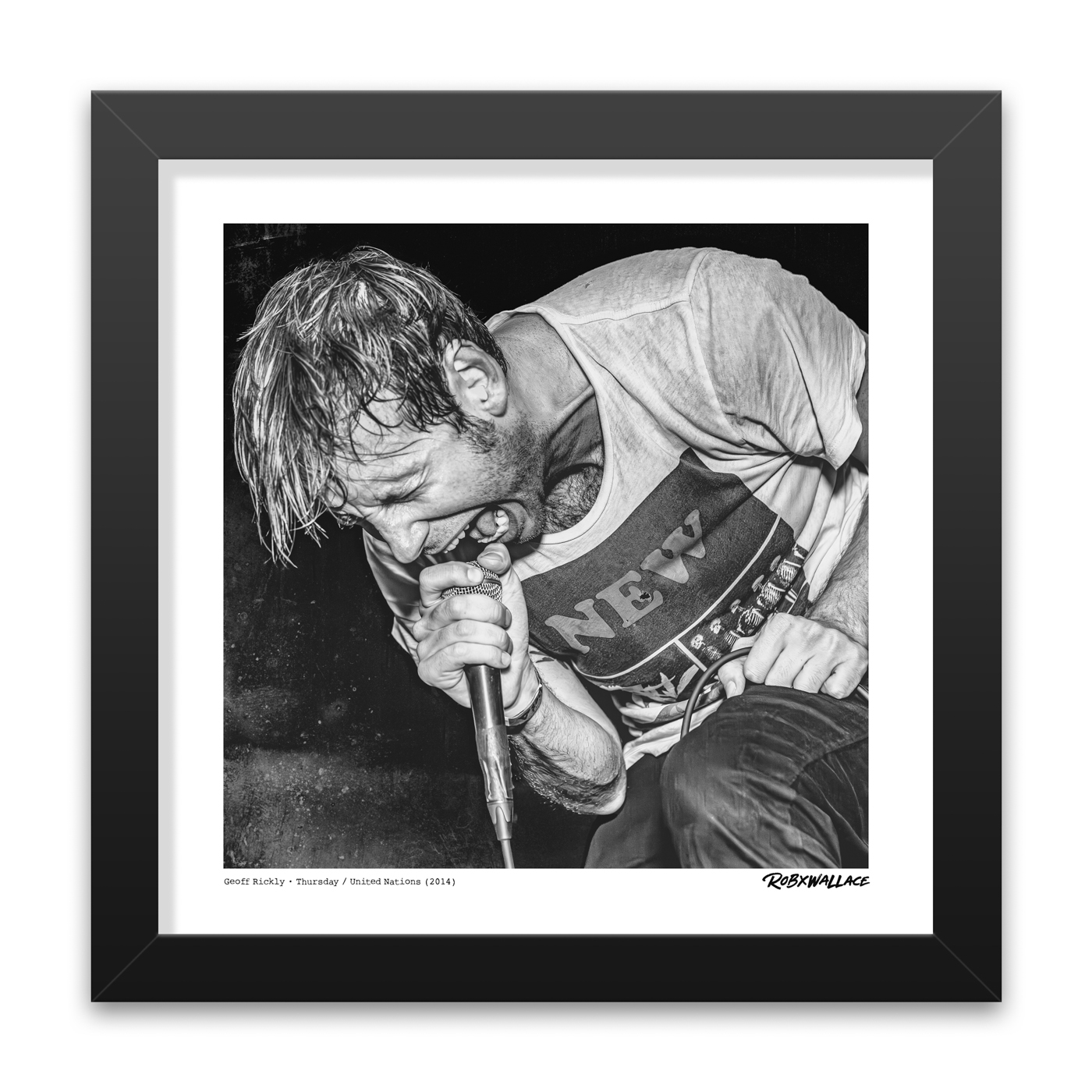 Detailed close up view of a 12x12 square framed fine art punk print the passion and chaotic stage presence of Geoff Rickly mid-performance.