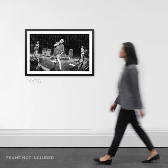 24x36 framed melodic hardcore concert Graphic Design print of Milo Aukerman from the Descendents live at the Hollywood Palladium, displayed on an art gallery wall for scale.