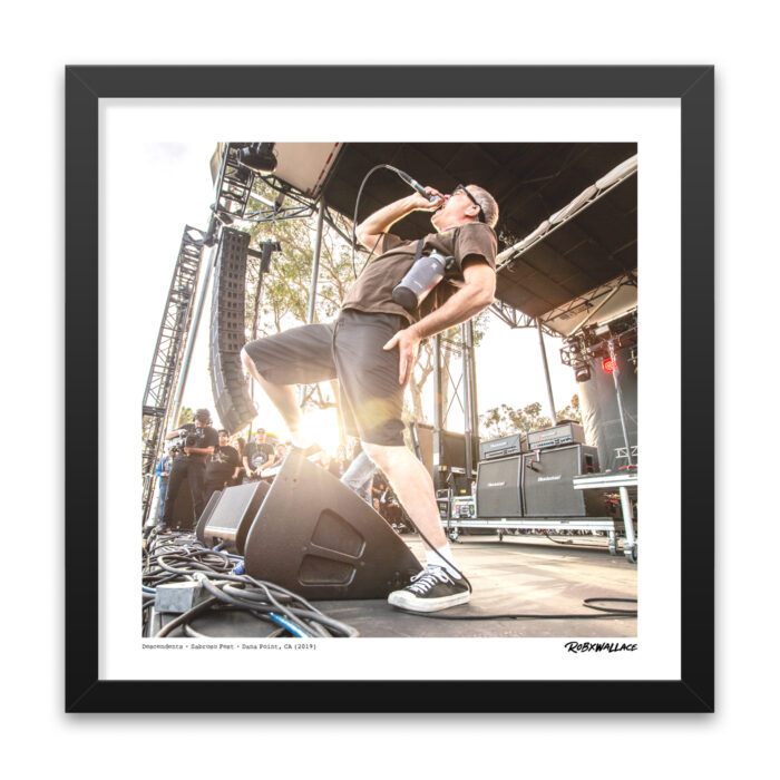 Close up look at an 18x18 square framed melodic hardcore print featuring Milo Aukerman mid-lyric with his signature water jug asset during a Southern California show.