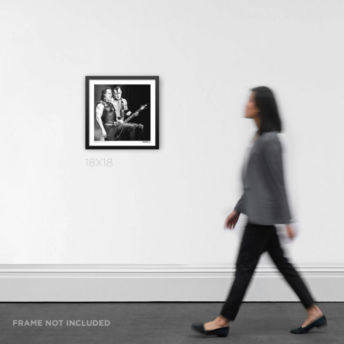 18x18 square framed live performance photo print highlighting a landmark milestone in punk history between Danzig and Doyle, styled in a room layout to show product scale.