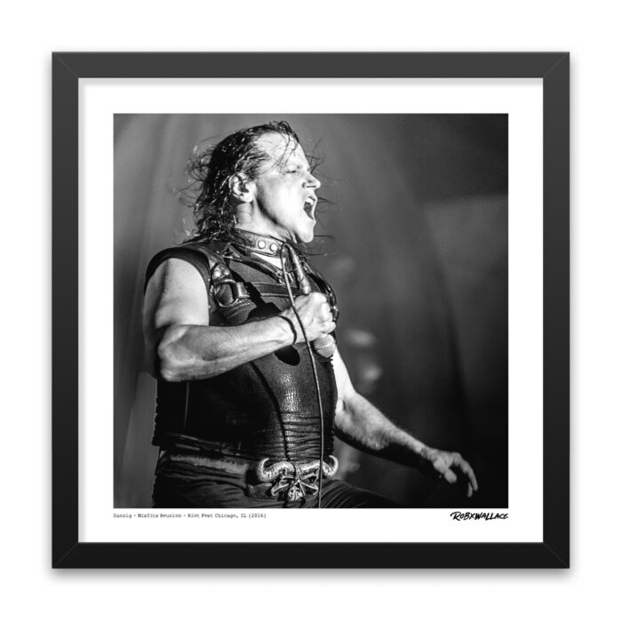 Detailed look at an 18x18 square framed music history fine art print isolating the intense stage presence and leather-clad focus of Glenn Danzig live on stage by RobxWallace.