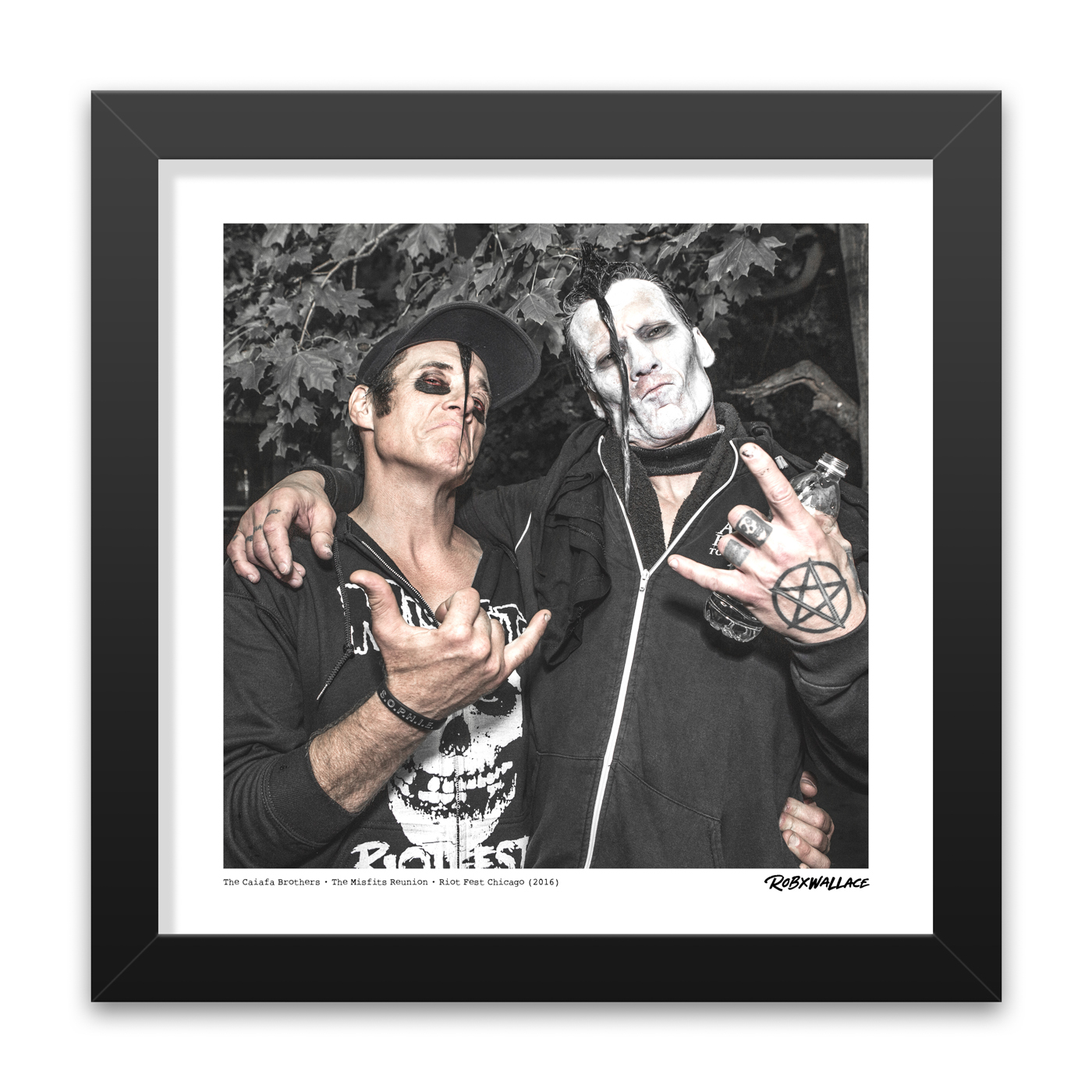 Detailed close up view of a 12x12 square framed fine art music print Jerry Only and Doyle sharing a personal candid moment backstage in Douglas Park.