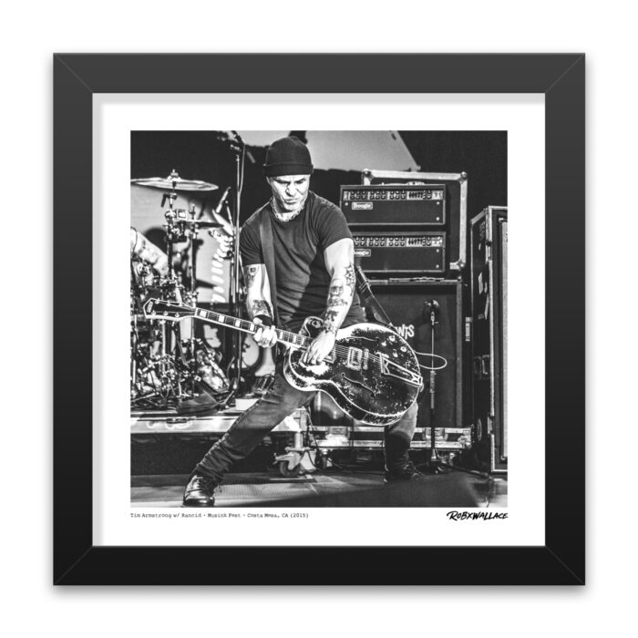 Close up of a 12x12 square framed fine art poster print the high-intensity stage lighting silhouette of Rancid's frontman in Costa Mesa, California.