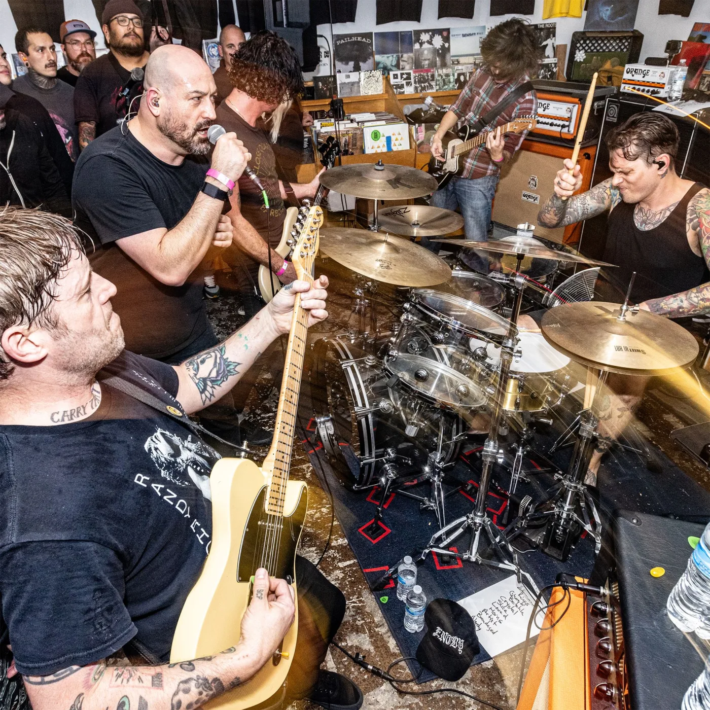 Intimate live hardcore punk concert photography print by Rob Wallace capturing vocalist Jeffrey Moreira screaming into the microphone alongside guitarist Ryan Primack during a packed Poison The Well performance inside Programme Skate Sound in Fullerton, California.
